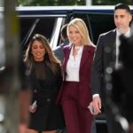 Pam Bondi shows up to meet Epstein survivors while sporting an open shirt displaying a cancer bandage